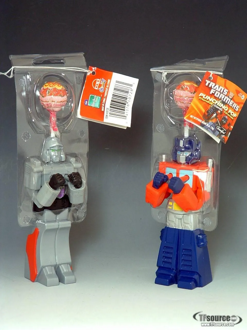 Optimus Prime and Megatron Punching Pop Candy | Transformers